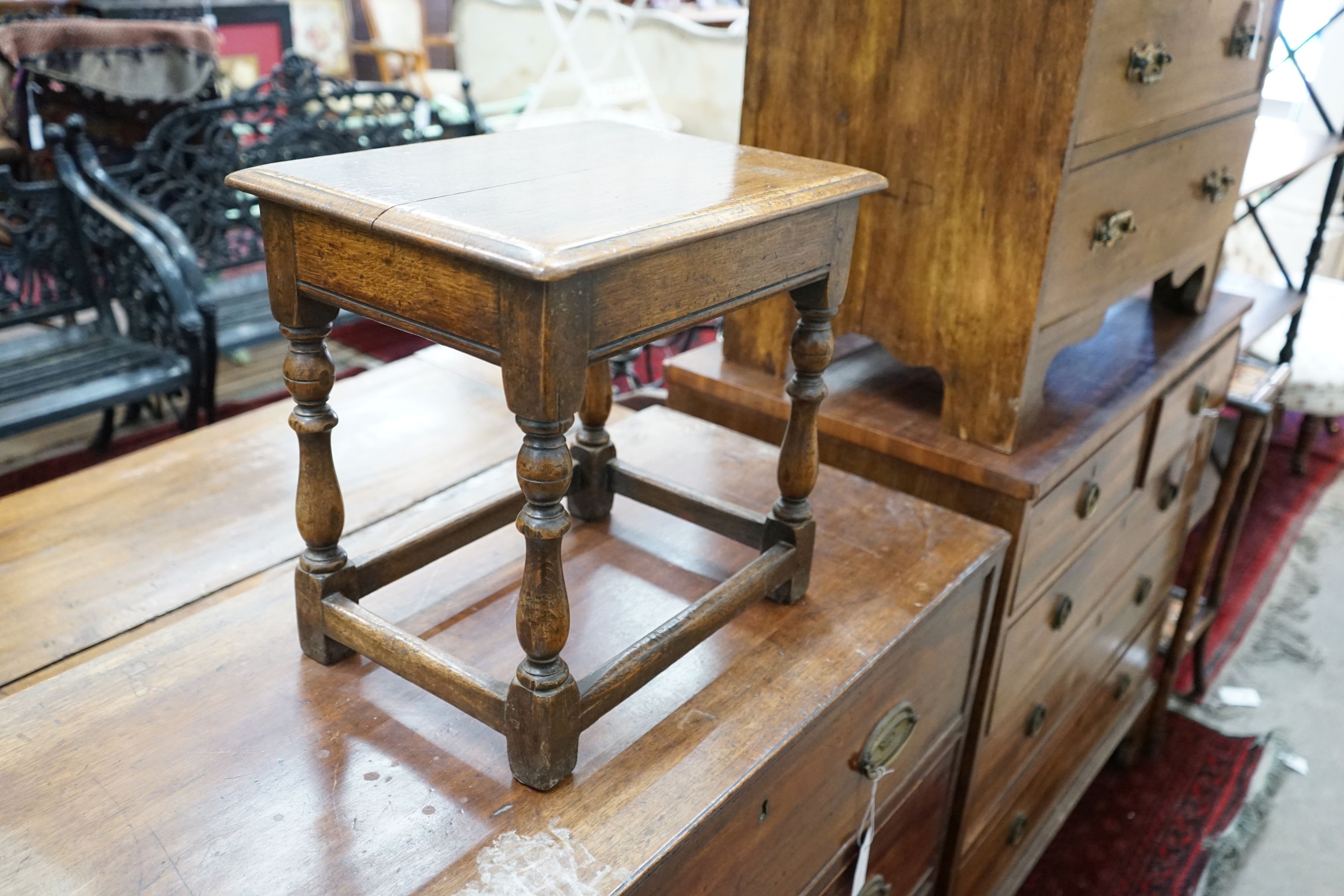 An early 20th century oak three drawer chest, width 77cm, depth 43cm, height 67cm together with an 18th century style oak joint stool